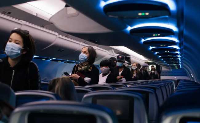 PASSENGERS WEARING MASKS ON DELTA AIRLINES
