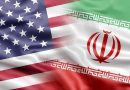 Iranian and USA flags in war